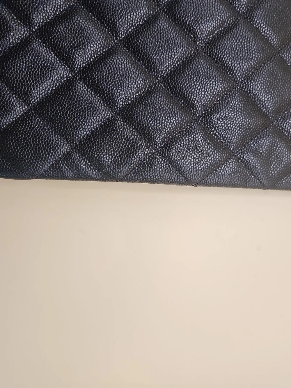 CHANEL Black Quilted Caviar Leather Pouch with Gold CC